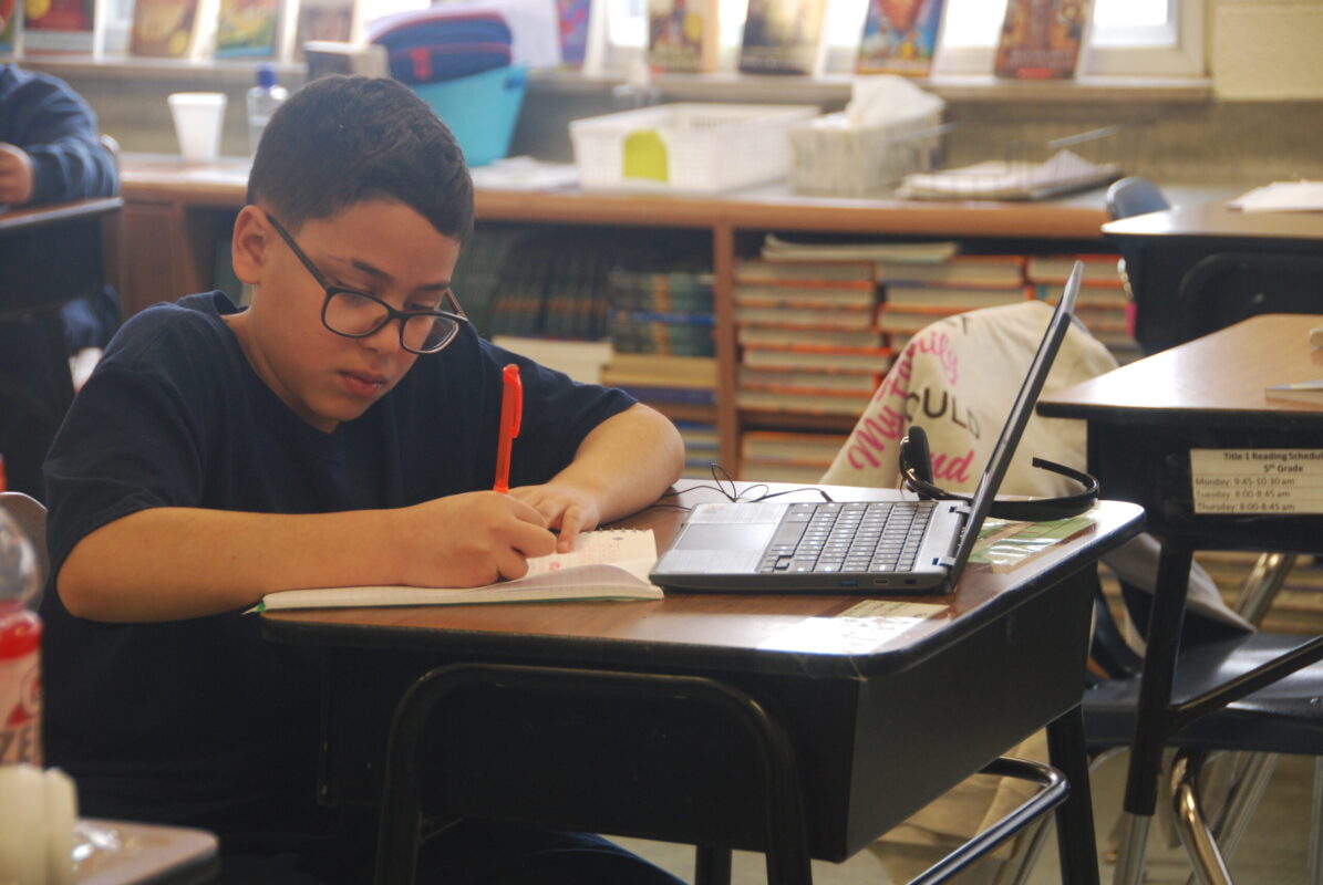 child at desk